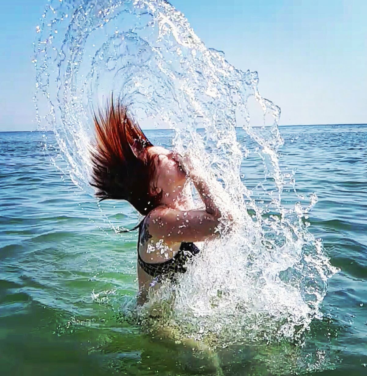 Foto Frau im Wasser